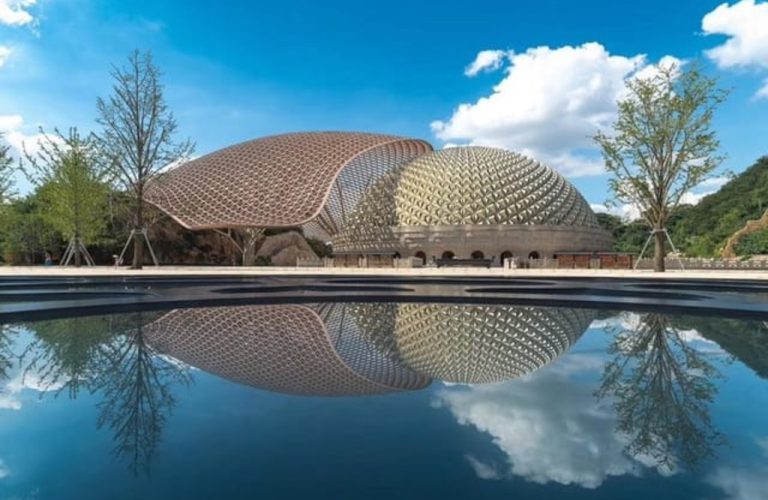 Serene Reflection of Building in Calm Water