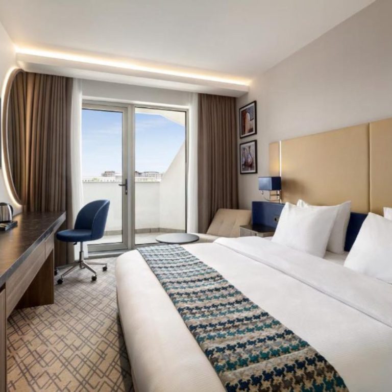 A hotel room large bed