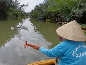 Sitting in a coconut basket!