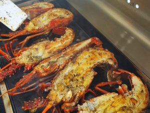 Grilled fresh lobsters on the private cruise